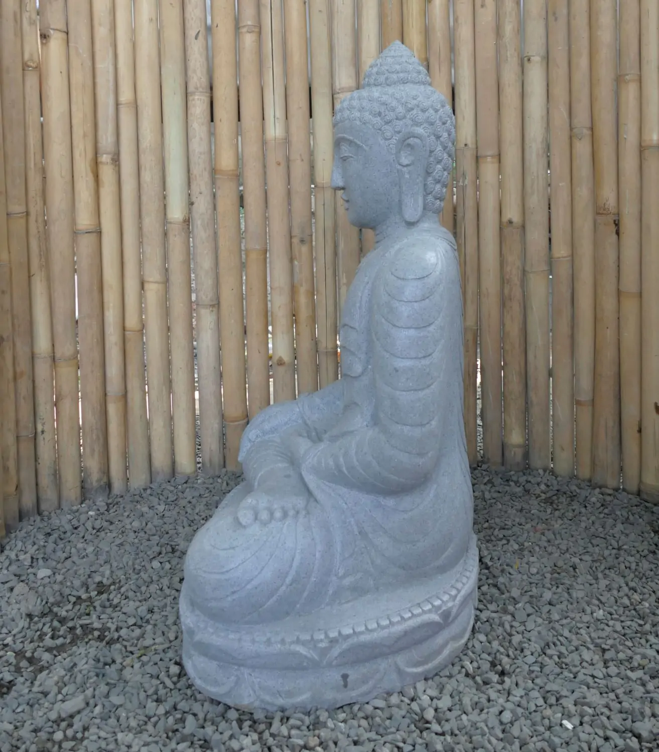  Product image 5 of the product “Seated Buddha made of Riverstone in Bhumisparsha - gesture of touching the earth. 80cm height. ”